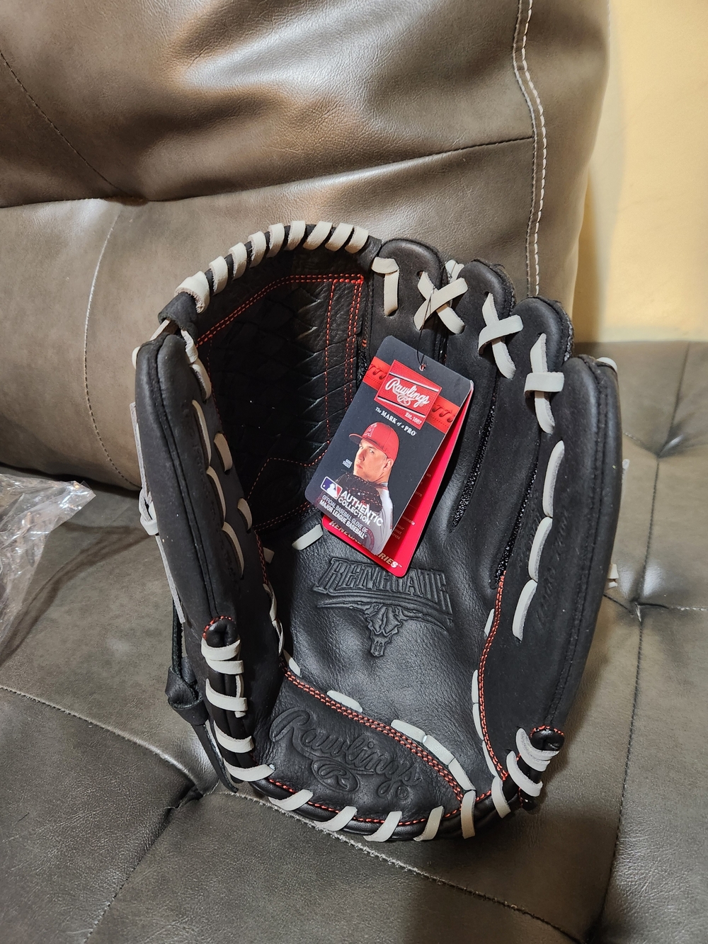Rawlings Black Baseball Glove with White Lacing and Red Stitch Accents